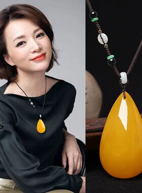 白玉挂绳水滴蜜蜡吊坠2025新款毛衣链高级感轻奢小众长款项链女款