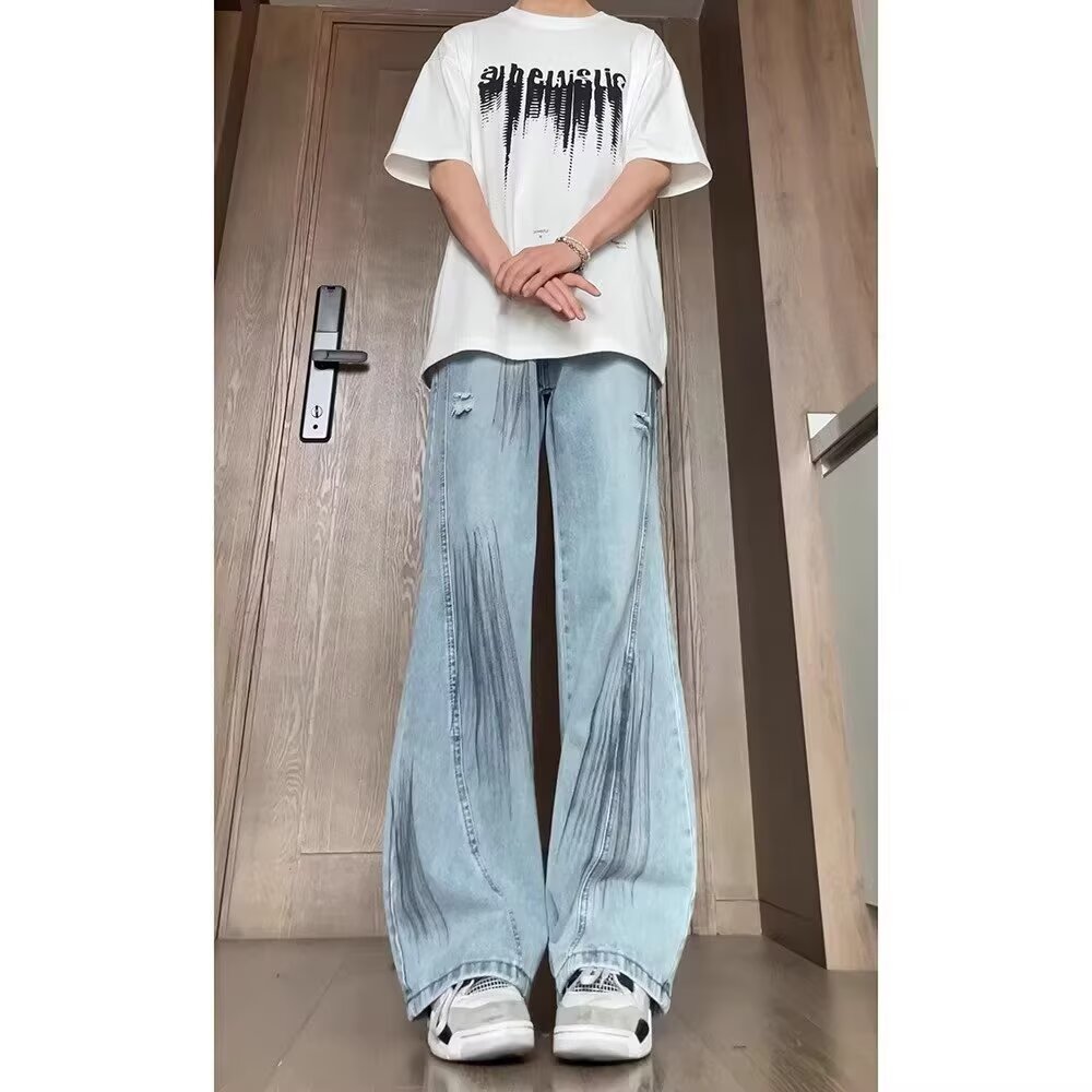 美式泼墨弯刀破洞牛仔裤男夏季宽松阔腿裤子设计感渐变直筒微喇裤
