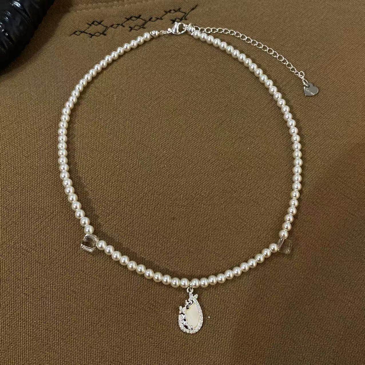 气质优雅潮流白色珍珠水滴项链轻奢高级感时髦精致小众锁骨链新款,饰品/流行首饰/时尚饰品新,项链,淘宝优惠券,粉丝福利购,淘宝优惠卷