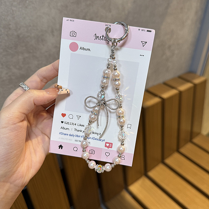 ins日韩闪钻珍珠蝴蝶结链条包包挂件个性创意百搭少女新款潮