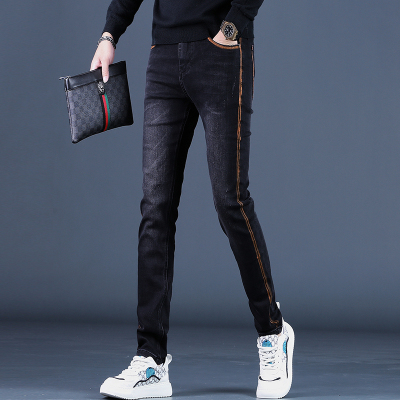 2025秋冬季新款黑色印花牛仔裤男潮修身紧身潮流休闲小脚裤子韩版
