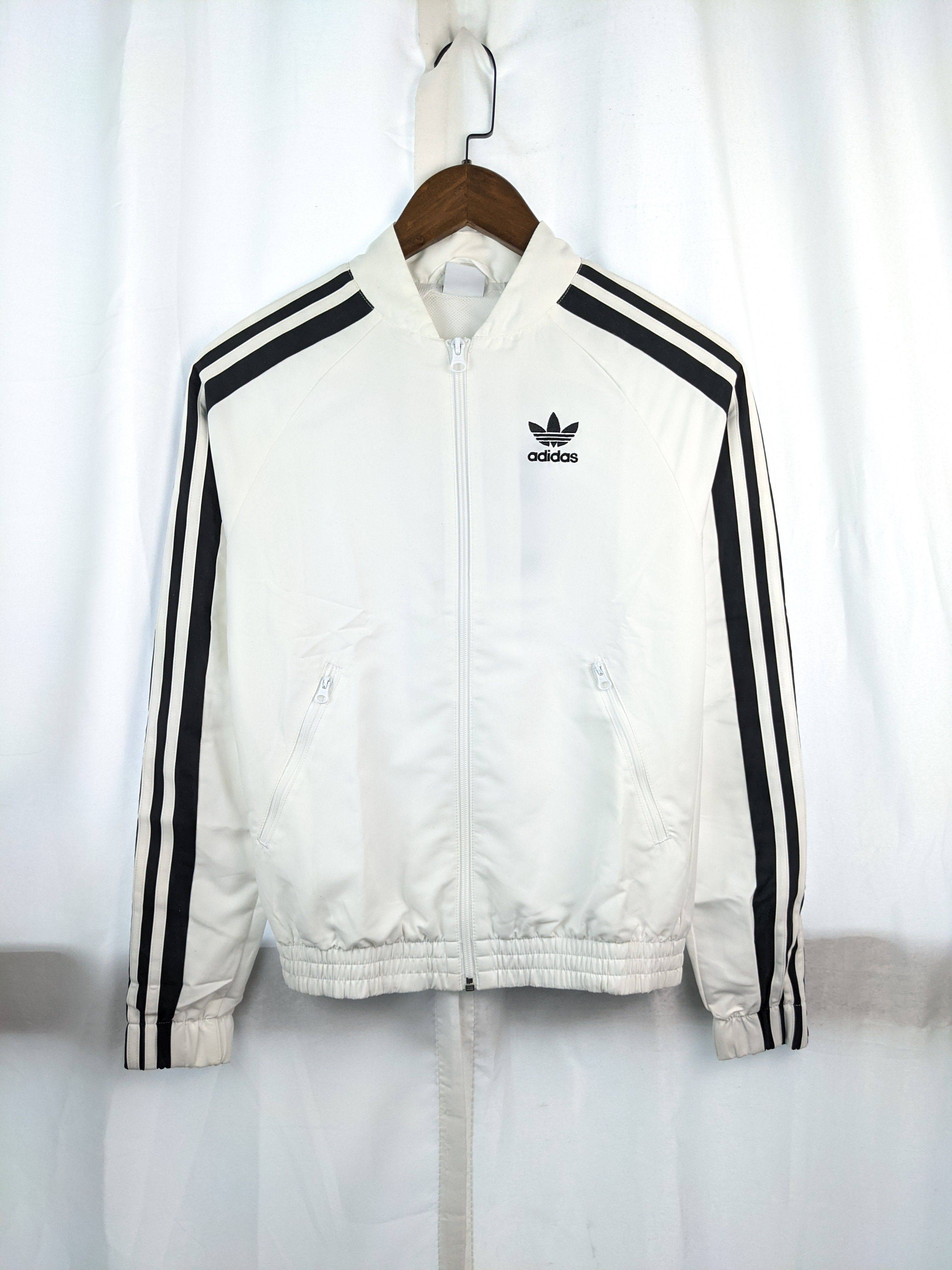 ADIDAS WINDBREAKER AUG 女子梭织外套 DP8586 仓库存放稍有脏迹.
