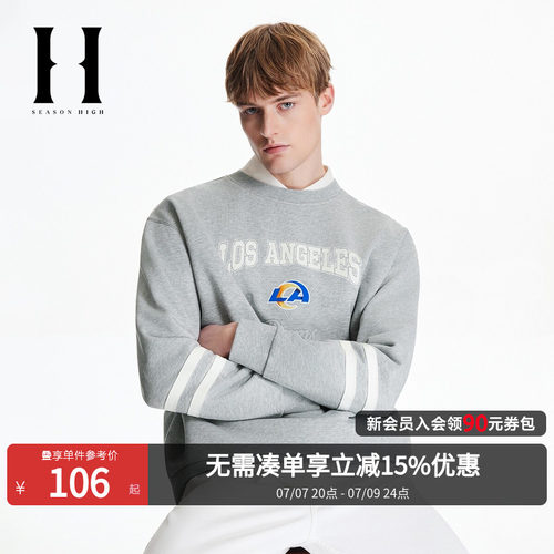 袖部条纹拼接，背部底摆贴布装饰
