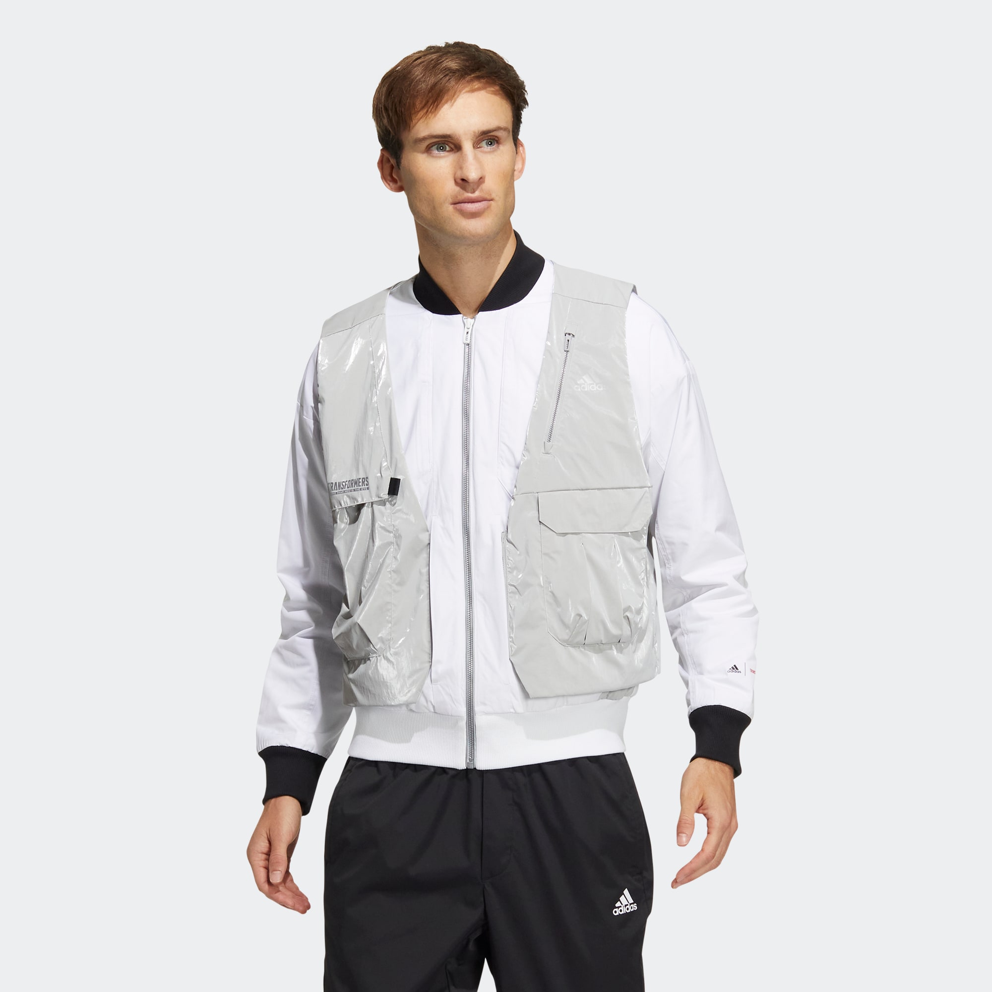 Adidas/阿迪达斯 男女变形金刚联名情侣款运动休闲夹克外套HM7467