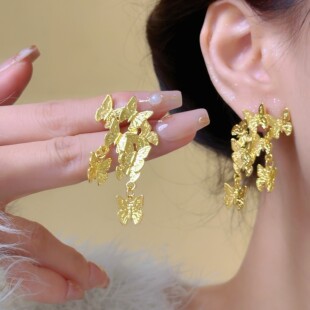 群碟飞舞金色耳环女复古轻奢高级感小众设计绝美灵动中古耳饰耳夹
