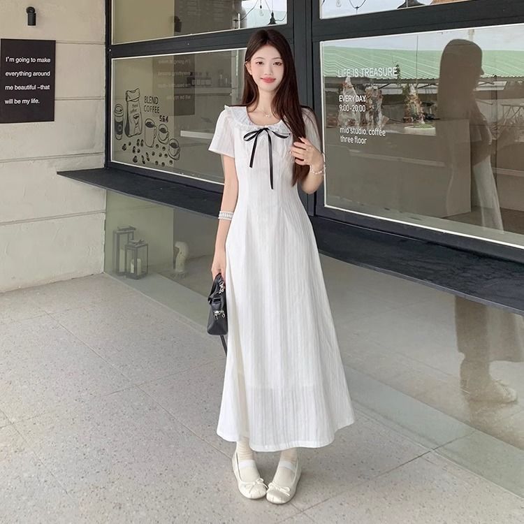 法式温柔风花边娃娃领短袖连衣裙夏季新款收腰显瘦气质短裙女