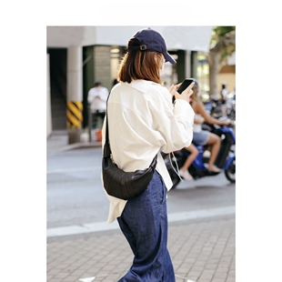 韩国牛角包女2025新款羊皮羊角包真皮洋气百搭可颂包饺子包斜挎包