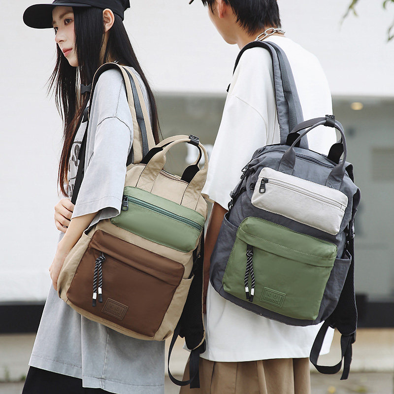 撞色双肩包大学生电脑大容量书包轻便防水户外旅行多功能登山背包