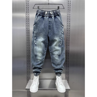 大码300斤加绒厚牛仔裤男女冬新款束脚做旧束脚裤排扣拼接哈伦裤2