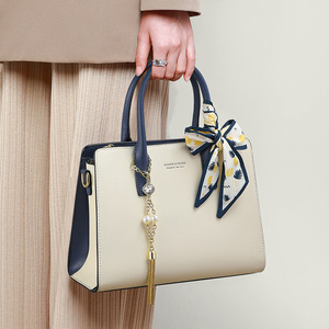 法国设计师CanaryKiss包包新款女包手提包秋冬时尚真皮高级感大容