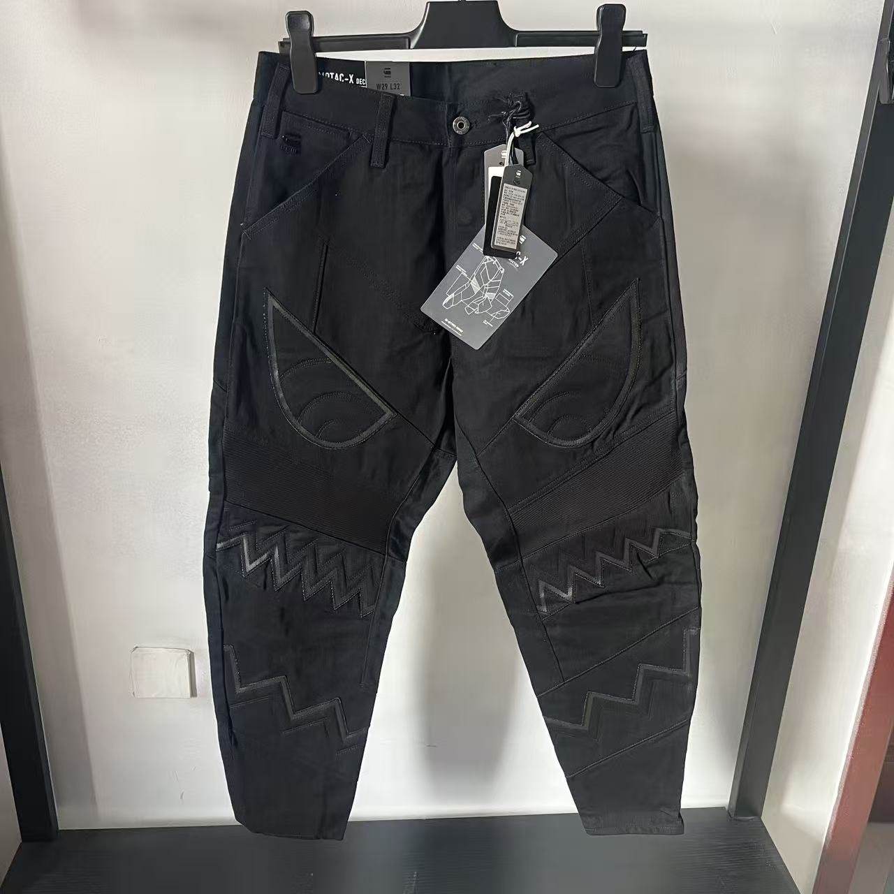 春秋款正品男士拼接小恶魔牛仔裤