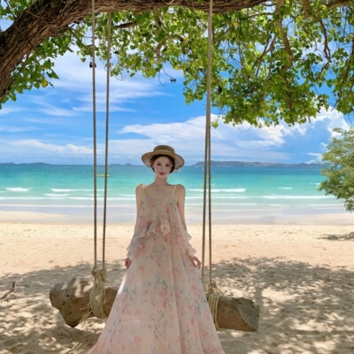 海边度假风粉色印花吊带连衣裙女V领荷叶边减龄绝美不撞款长裙