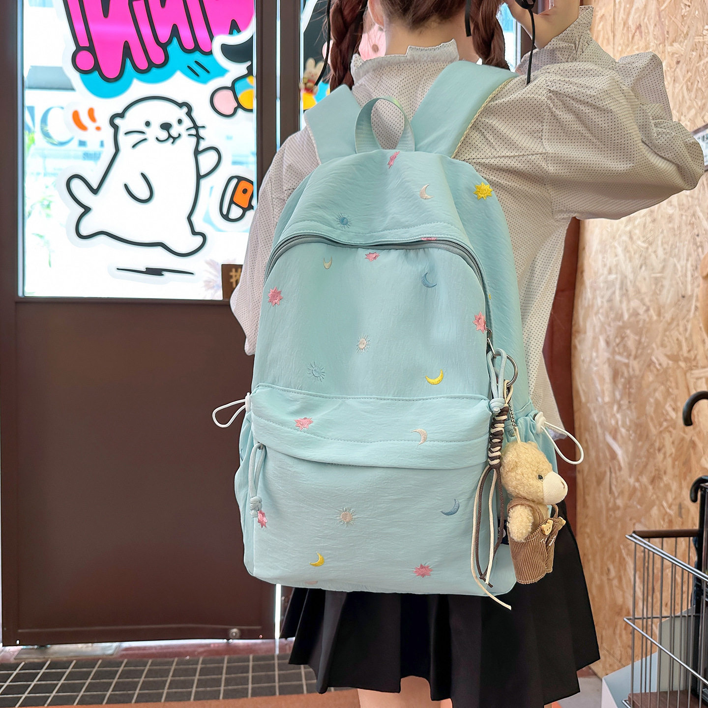 初中女生可爱星星月亮双肩背包图片
