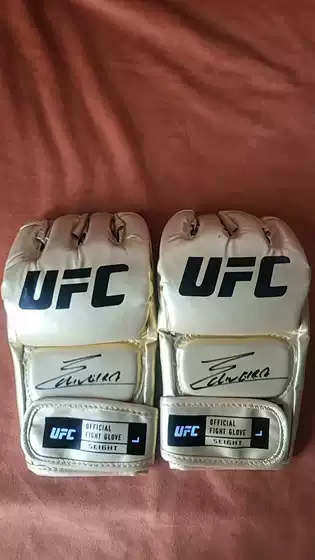 Charles Oliveira Autographed UFC Champion Boxing Gloves