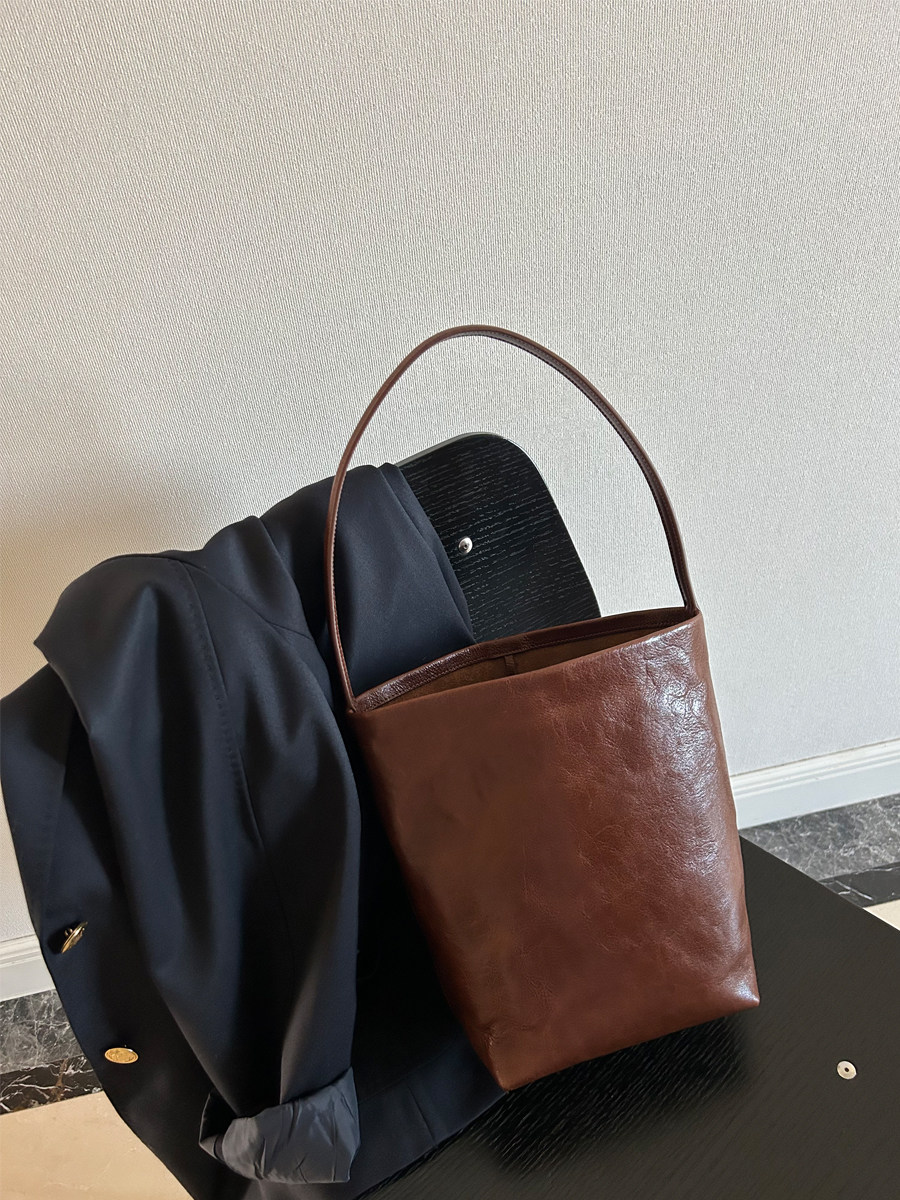 头层植鞣牛皮 时髦简约 美拉德色系水桶包 特,箱包皮具/热销女包/男包,水桶包,淘宝优惠券,粉丝福利购,淘宝优惠卷