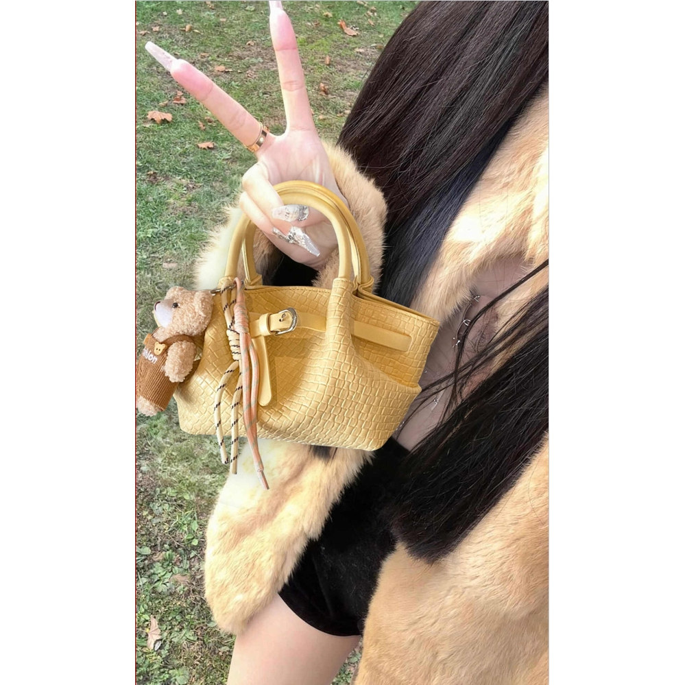 黄色菜篮子水桶包包女式2026新款精致高级感轻奢小众不撞款斜挎包