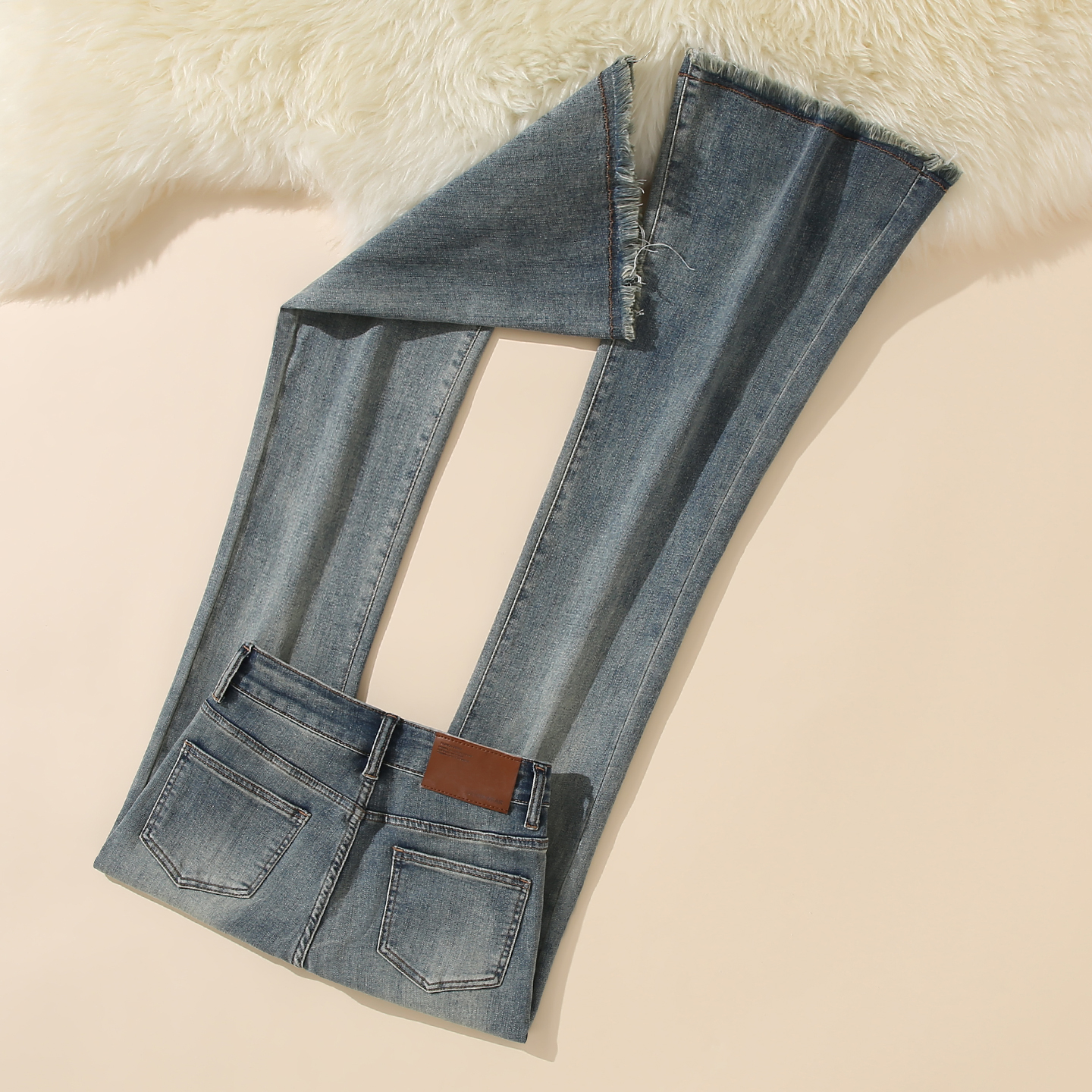 艾格怀旧蓝毛边做旧高腰微喇牛仔女2025秋冬裤弹力显瘦拖地裤