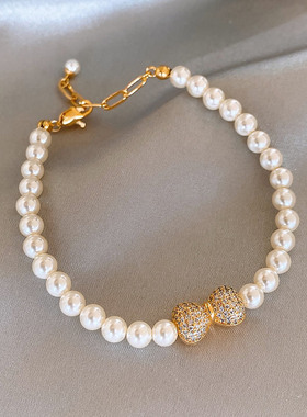 2026新款金色满钻蝴蝶结珍珠手链女复古轻奢小众手串高级感手饰品