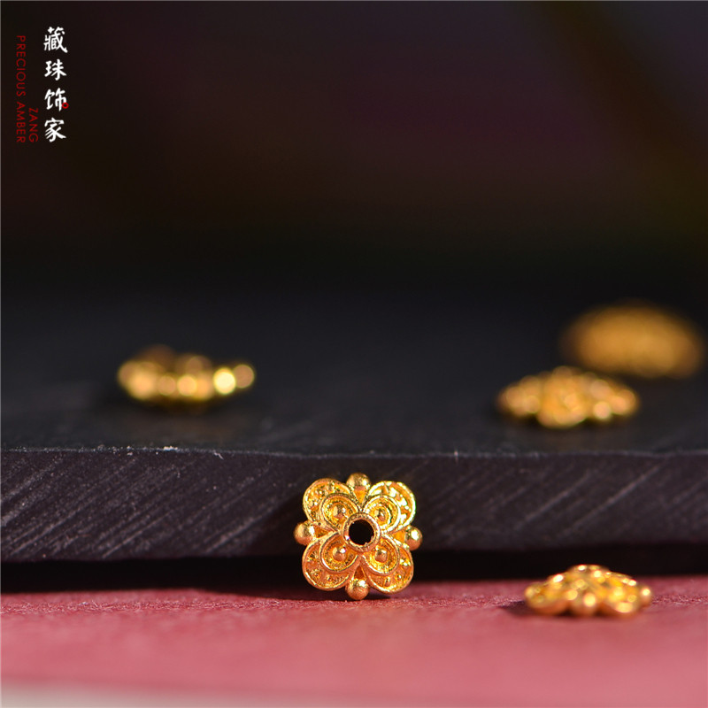 足金錾刻黄金花托隔片图片