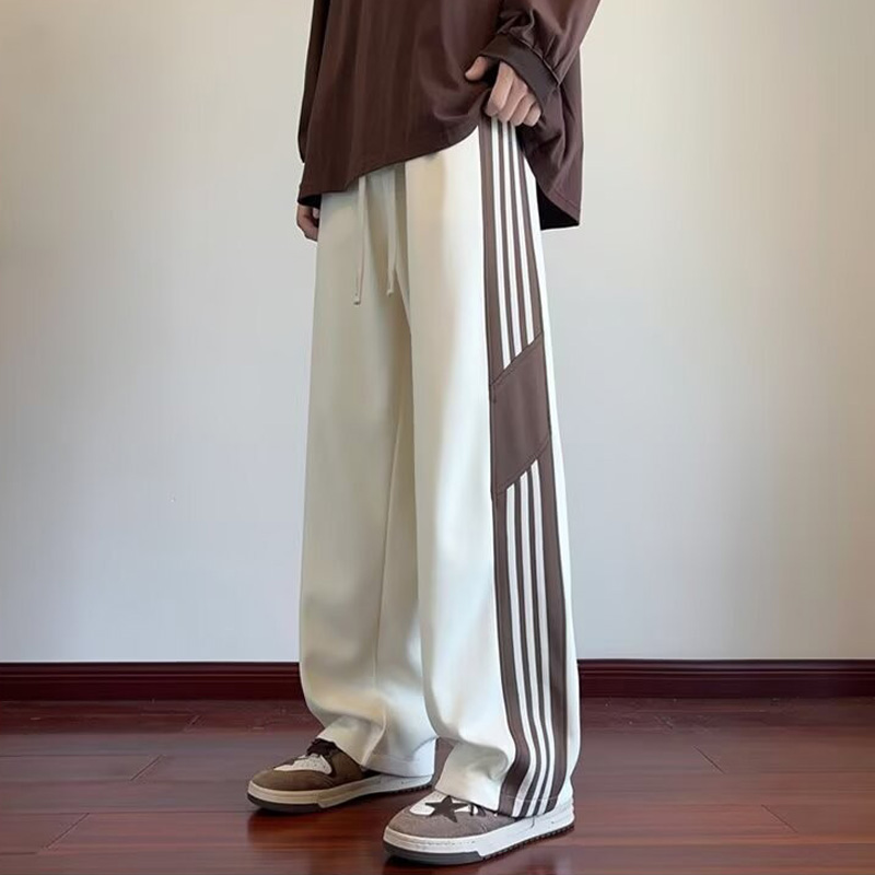 男裤子2025新款今年流行爆款超火的夏日松弛感穿搭卫裤白色休闲裤