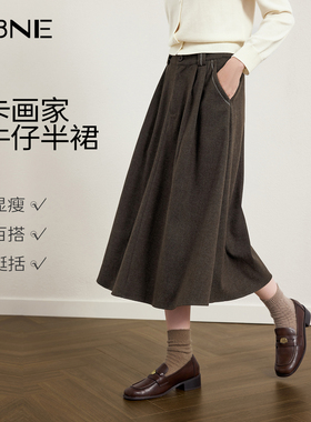 KBNE咖啡色仿牛仔a字半身裙女装2026春季新款长款高腰裙百褶裙子