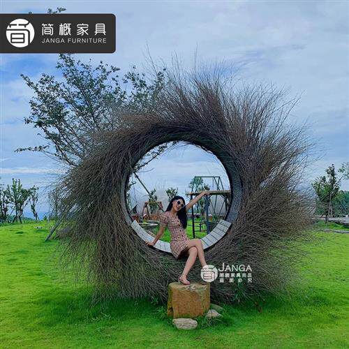 巴厘岛网红鸟巢秋千景区打卡婚纱拍摄道具创意圆形床圆形心形鸟巢