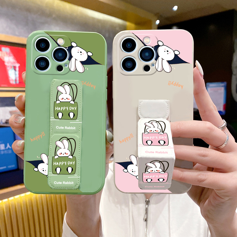 适用苹果16手机壳15Pro歪头兔14ProMax磁吸支架13ProMax折叠腕带12mini女款iPhone11/X/XS/XR/8/7/6S硅胶软壳