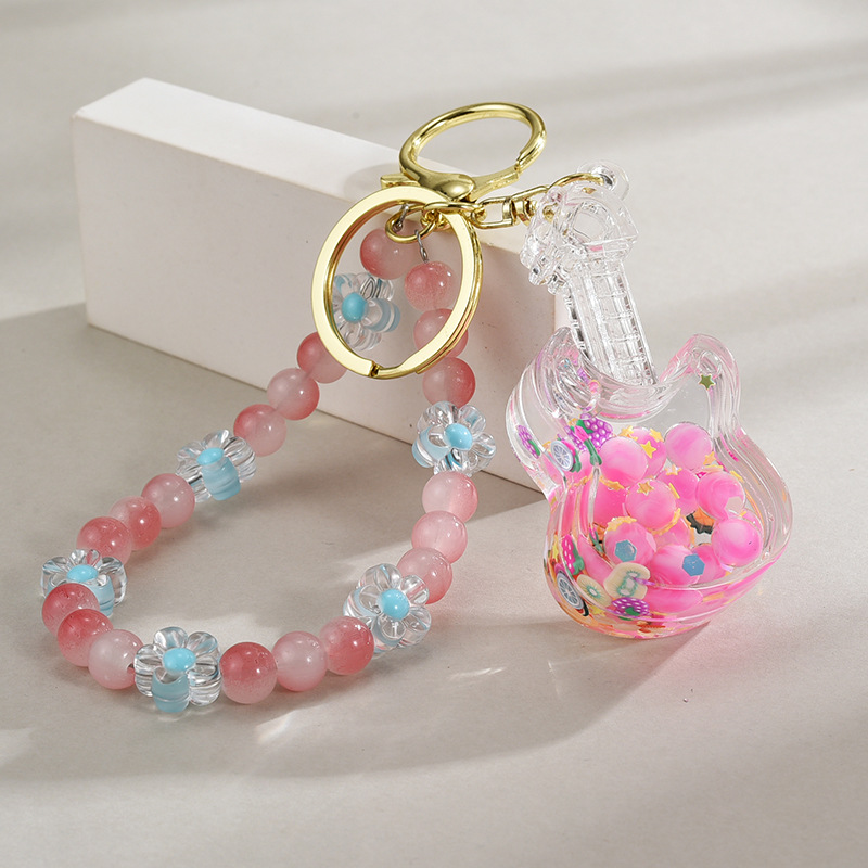 亚克力入油流沙瓶夜光钥匙扣创意手工串珠手机链挂件包挂饰小提琴