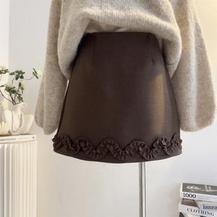 木耳花边毛呢短裙半身裙女2025年秋冬高腰a字包臀裙防走光呢子裙