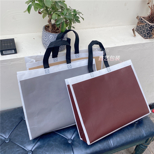 新款覆膜无纺布加厚防水免税店袋子服装店手提包装购物袋简约高档