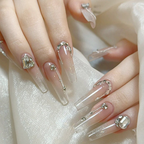 橘指大方穿戴甲长款手工闪钻猫眼