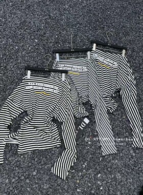 斜肩条纹长袖T恤女春季2026新款韩版独特印花一字领上衣A10011