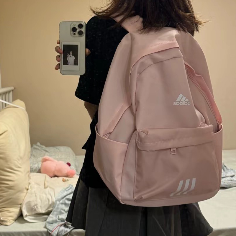 正品假一赔十粉色书包女双肩包