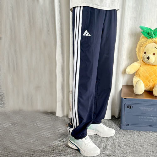 阿迪达斯蓝色裤子男夏季新款薄款长裤透气快干篮球束脚美式运动裤