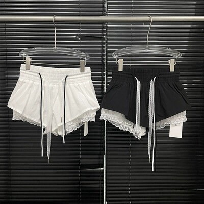 白蕾丝花边拼接别致休闲裤