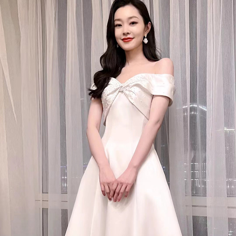 白色一字肩晚礼服裙女高级感高端轻奢小众生日婚纱缎面毕业法式夏
