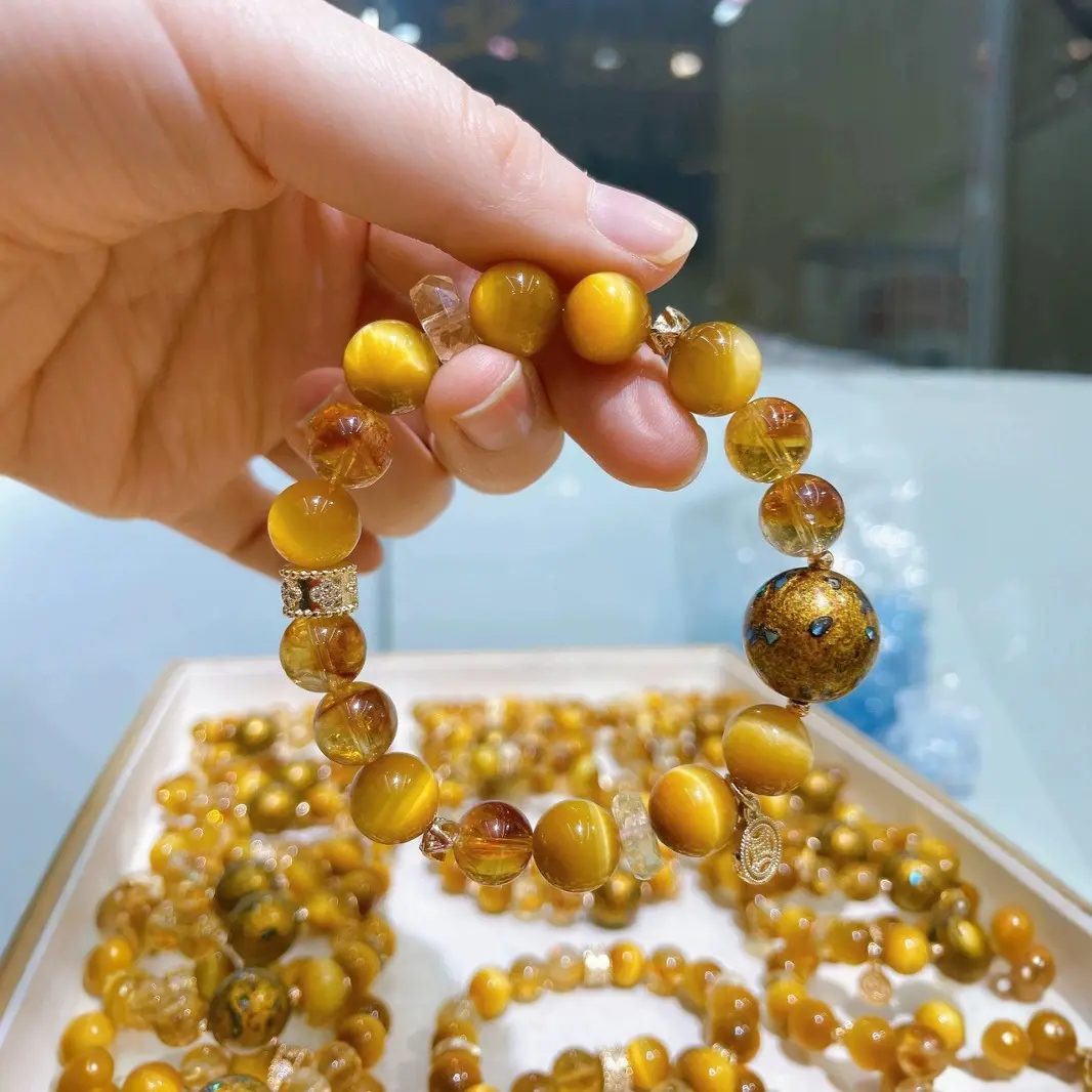 金霸爆款财款黄虎眼金虎眼仿黄塔晶茶晶设计款水晶手串串珠轻奢手