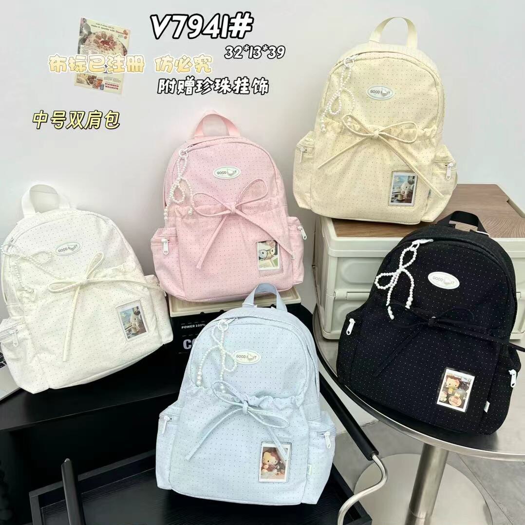 沐沐日系ins小清新蝴蝶结波点少女心双肩背包百搭高颜值学生书包