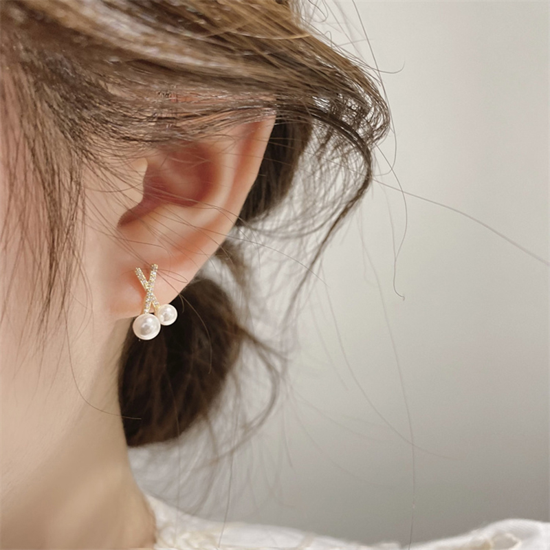 2023年新款潮交叉珍珠耳环纯银针小众甜美精致耳饰轻奢高级感耳环