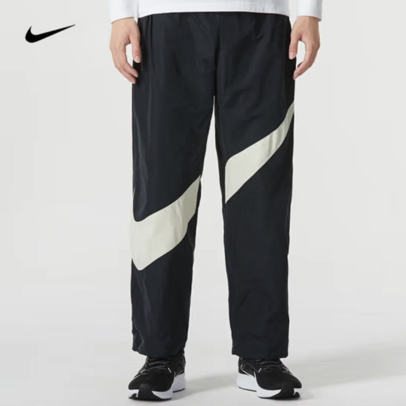 耐克大勾宽松直筒运动长裤