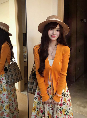 高级感橘色系带针织开衫女+橙色花朵显瘦高腰半身裙春日两件套装