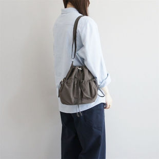 SM2日本原厂真品复古潮牌小众防水格子尼龙布女单肩斜挎水桶包