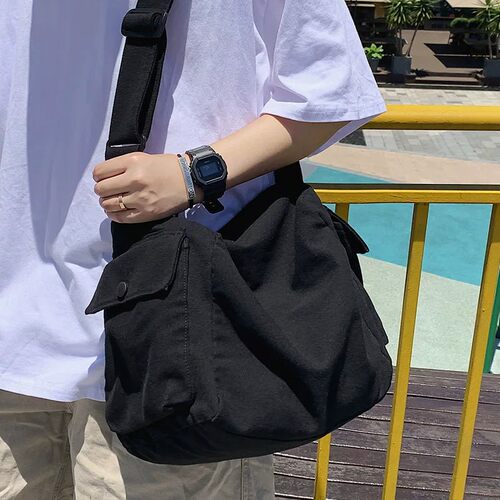 大容量复古帆布斜挎包男背包日系休闲邮差包学生单肩包旅行通勤包