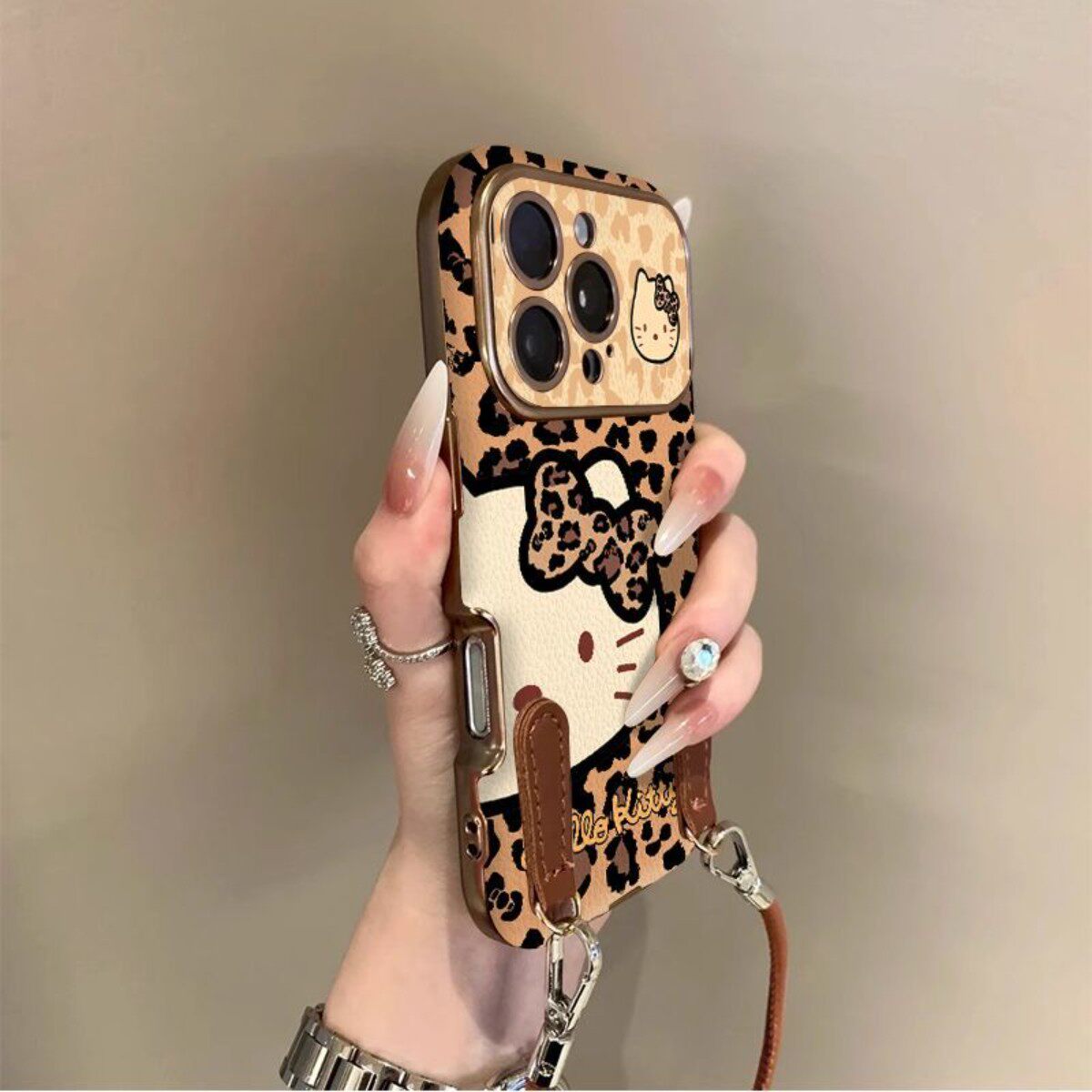 大脸豹纹凯蒂适用苹果17promax手机壳iPhone16pro新款16plus防摔15女款15Pro男14情侣12带挂绳11小羊皮