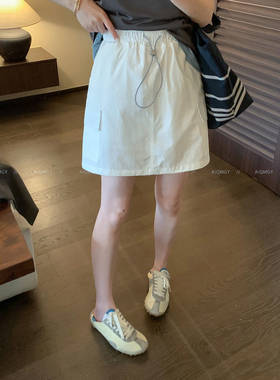 爱情魔鬼鱼 纯色松紧腰抽绳工装半身裙女2026夏季新款宽松A字短裙