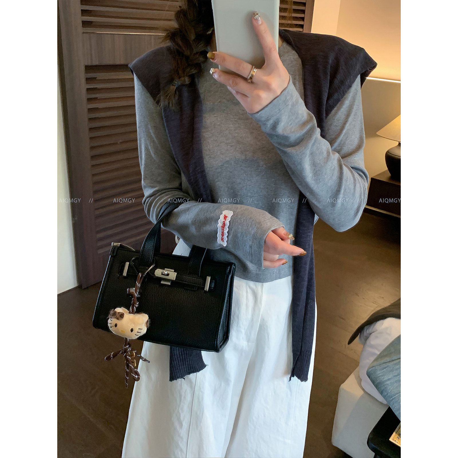 爱情魔鬼鱼 长袖圆领字母袖口垫肩T恤女2026春季新款时尚韩系上衣