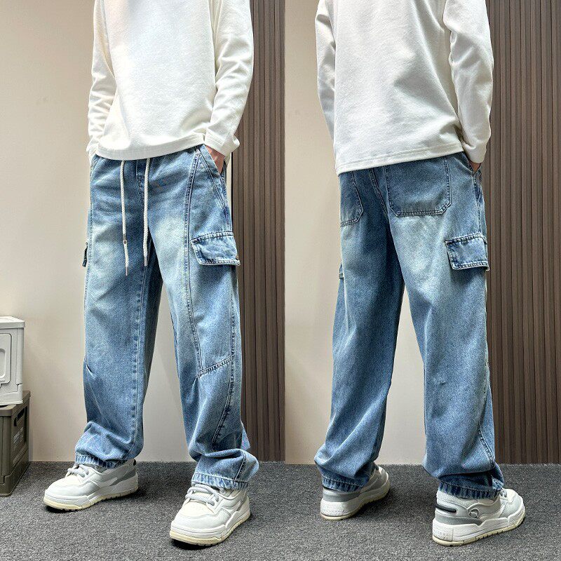 设计感蓝色松紧腰水洗弯刀牛仔裤男款2026春秋季宽松直筒工装裤子