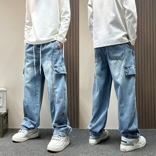 设计感蓝色松紧腰水洗弯刀牛仔裤男款2026春秋季宽松直筒工装裤子