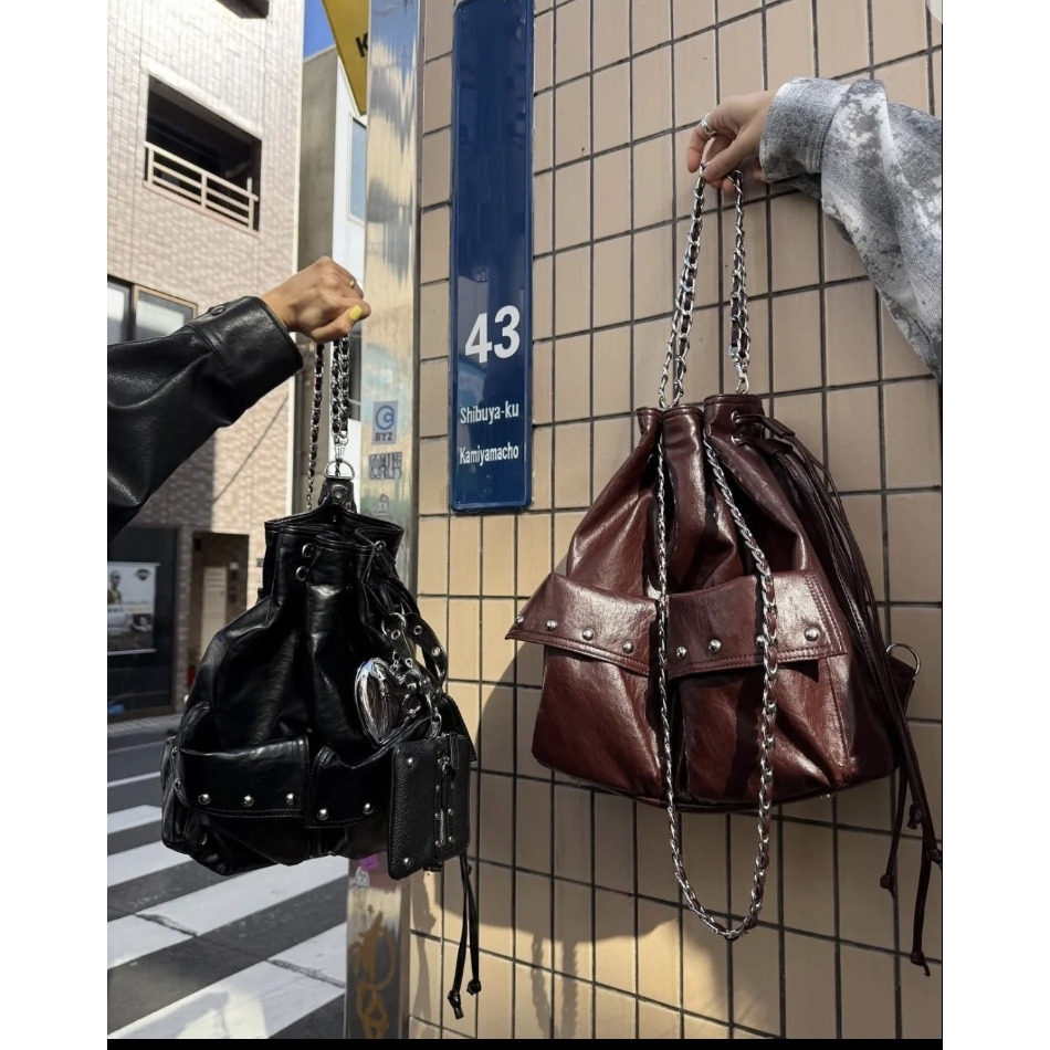 铆钉绑带抽绳链条包水桶双肩背包