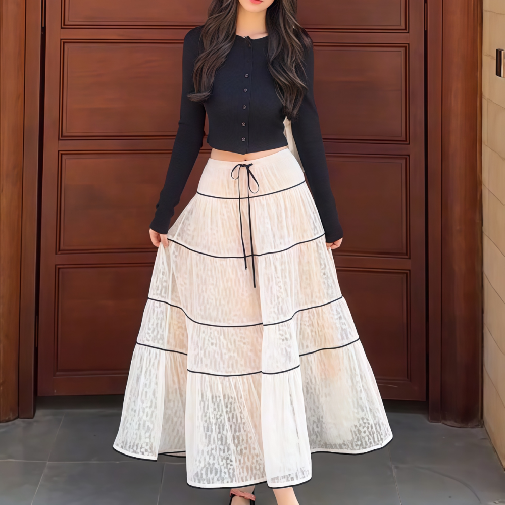 2026年春新款韩系轻奢小众休闲风黑色上衣白色半裙时尚套装女装